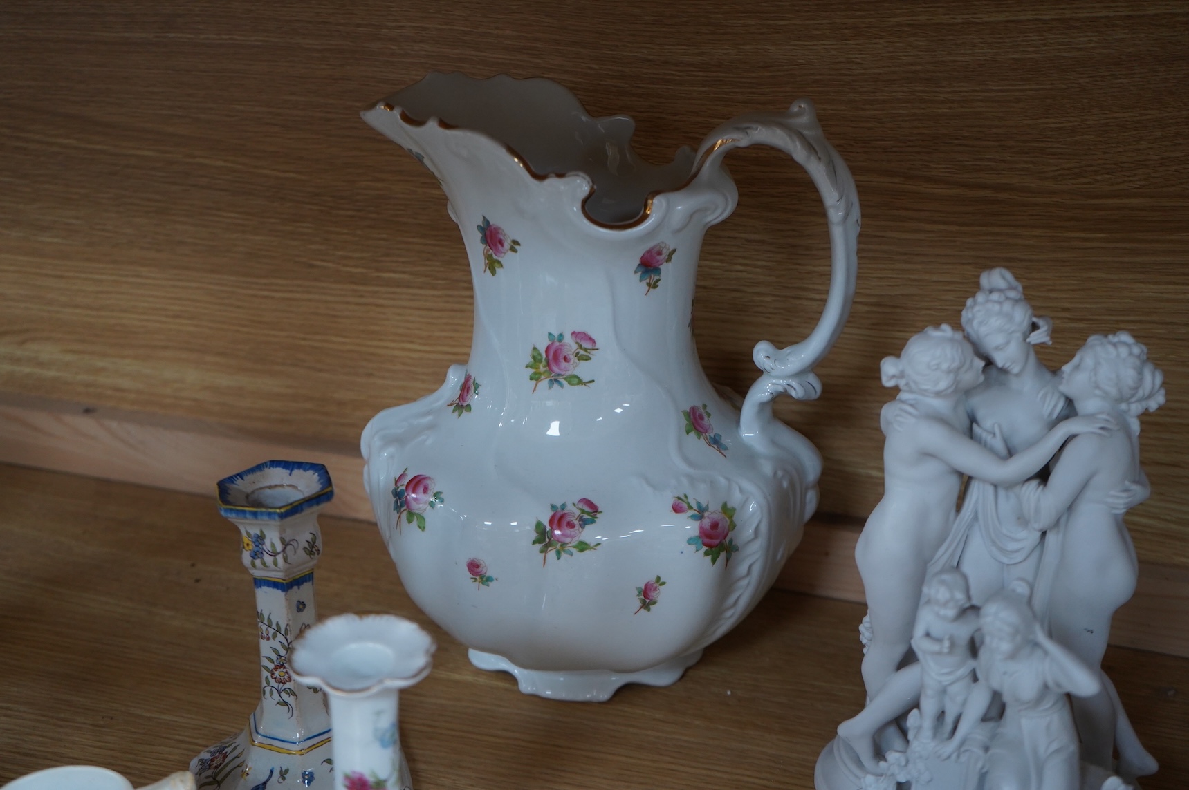 A bisque figure group of the Three Graces - 27cm high, a smaller smaller bisque figure, a pair of Vienna style coffee cans and saucers and a collection of mixed floral china. (22)
